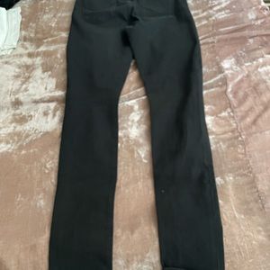 Hudson black jeans with rips in the knees